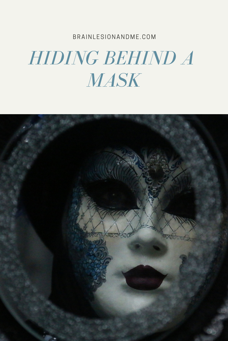 Hiding Behind A Mask Cover Image - decorated mask looking in a mirror 